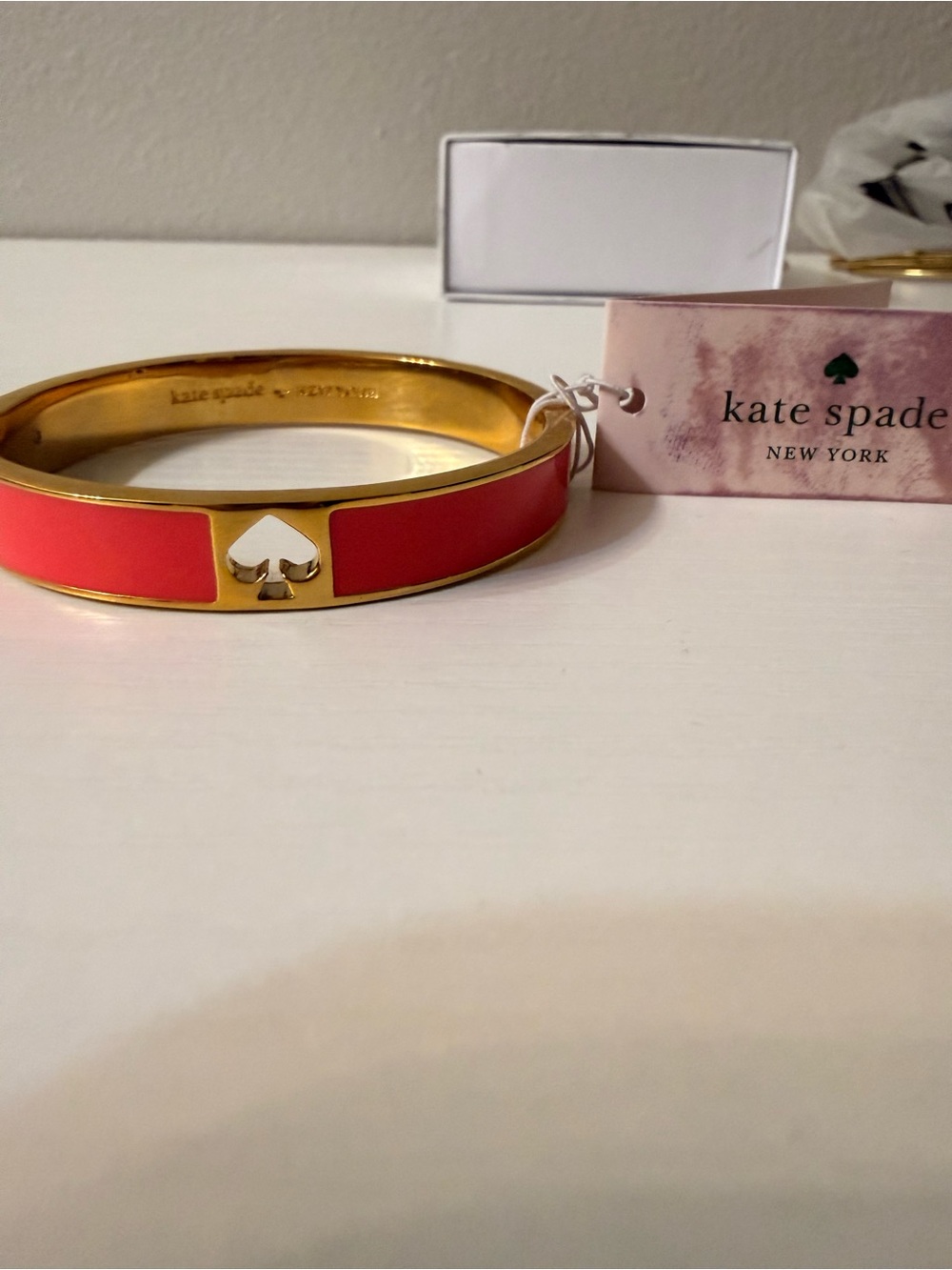 kate spade Gold-Tone Bracelet with Coral Pink Enamel Spade Accent